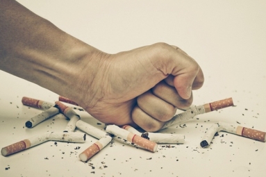 Negative Social Cues on Tobacco Packages May Help Smokers Quit