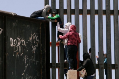 Video Clip Shows Punjabi Women, Children Crossing Border Fence into U.S.